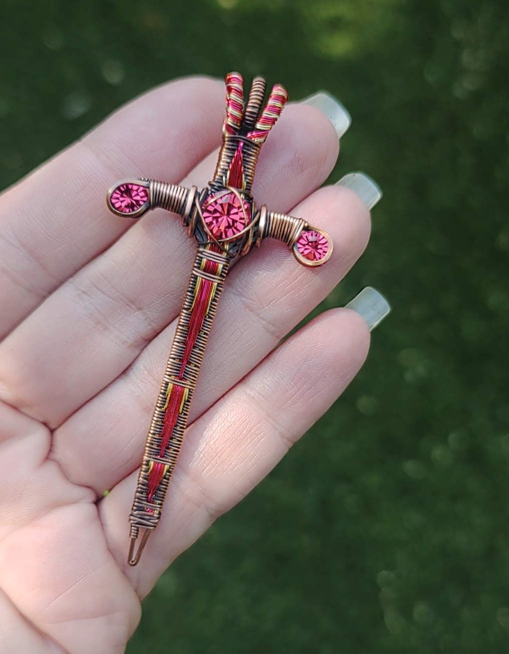 Red and Gold Sword ⚔️ with three crystals
