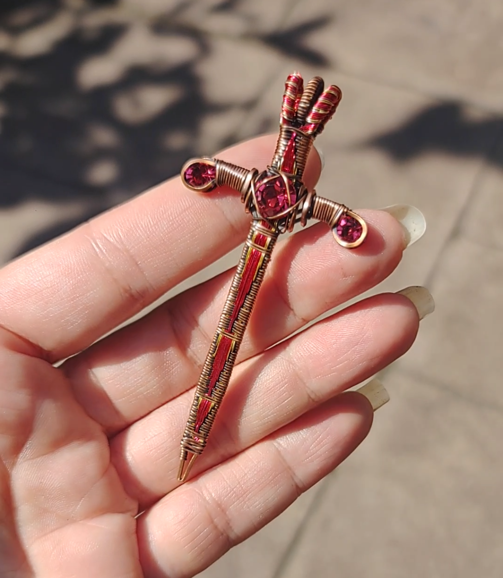 Red and Gold Sword ⚔️ with three crystals
