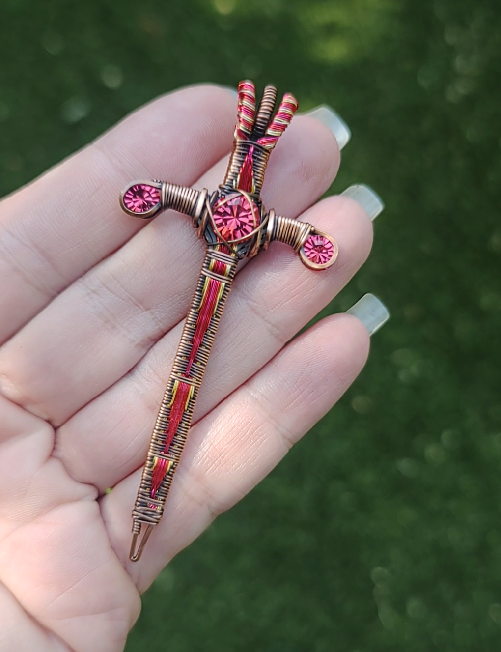 Red and Gold Sword ⚔️ with three crystals
