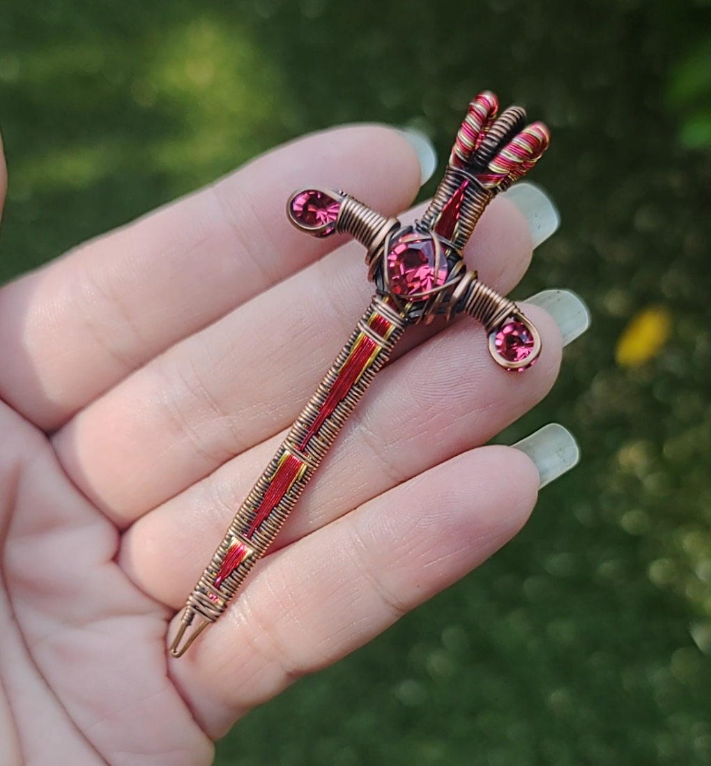 Red and Gold Sword ⚔️ with three crystals